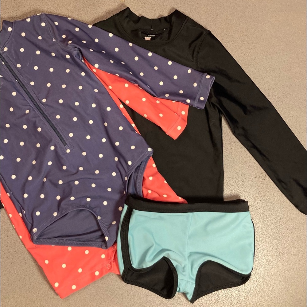 Primary swim set; shorts and rash guard